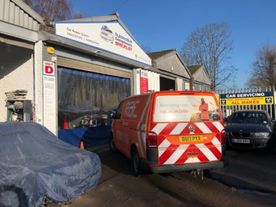 Rac van outside garage